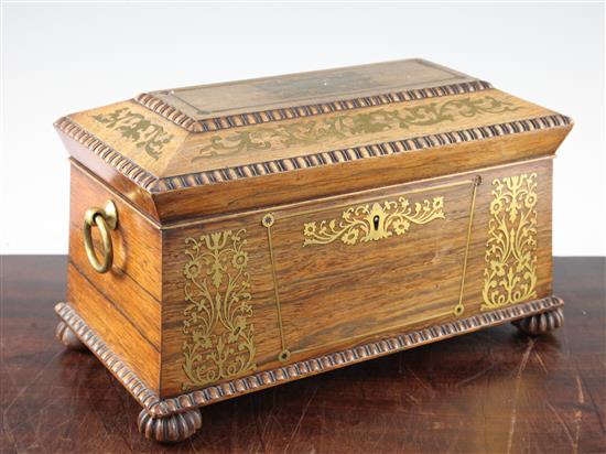 A Regency rosewood and brass inlaid sarcophagus shaped tea caddy, 13.75in.